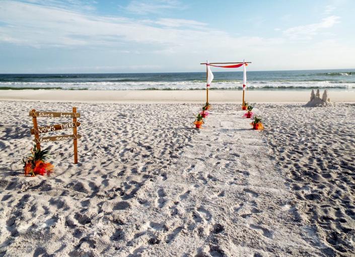 Guests will get some sand in their shoes at this ceremony!