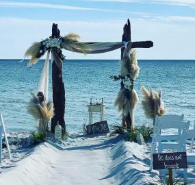 My Favorite arbor, the Driftwood Arbor with pompous grass and 30 chairs with the Corinthians 13 versus 4-7...