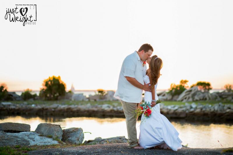 Bride and groom kissing 